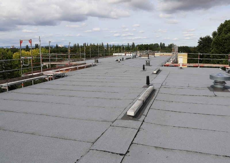 How We Assess Your Flat Roof to Determine the Right Repair Approach